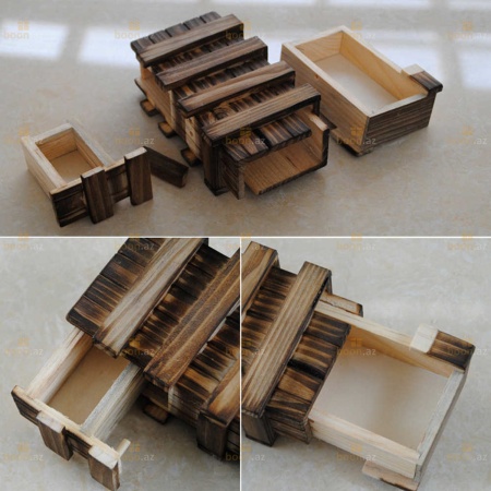 Деревянная шкатулка-головоломка с маленьким секретом.