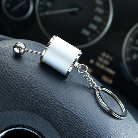 Брелок "Коробка передач" серебряный